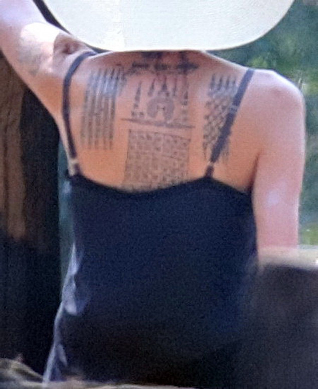 Angelina Jolie Debuts Three New, Massive Tattoos While Filming in
